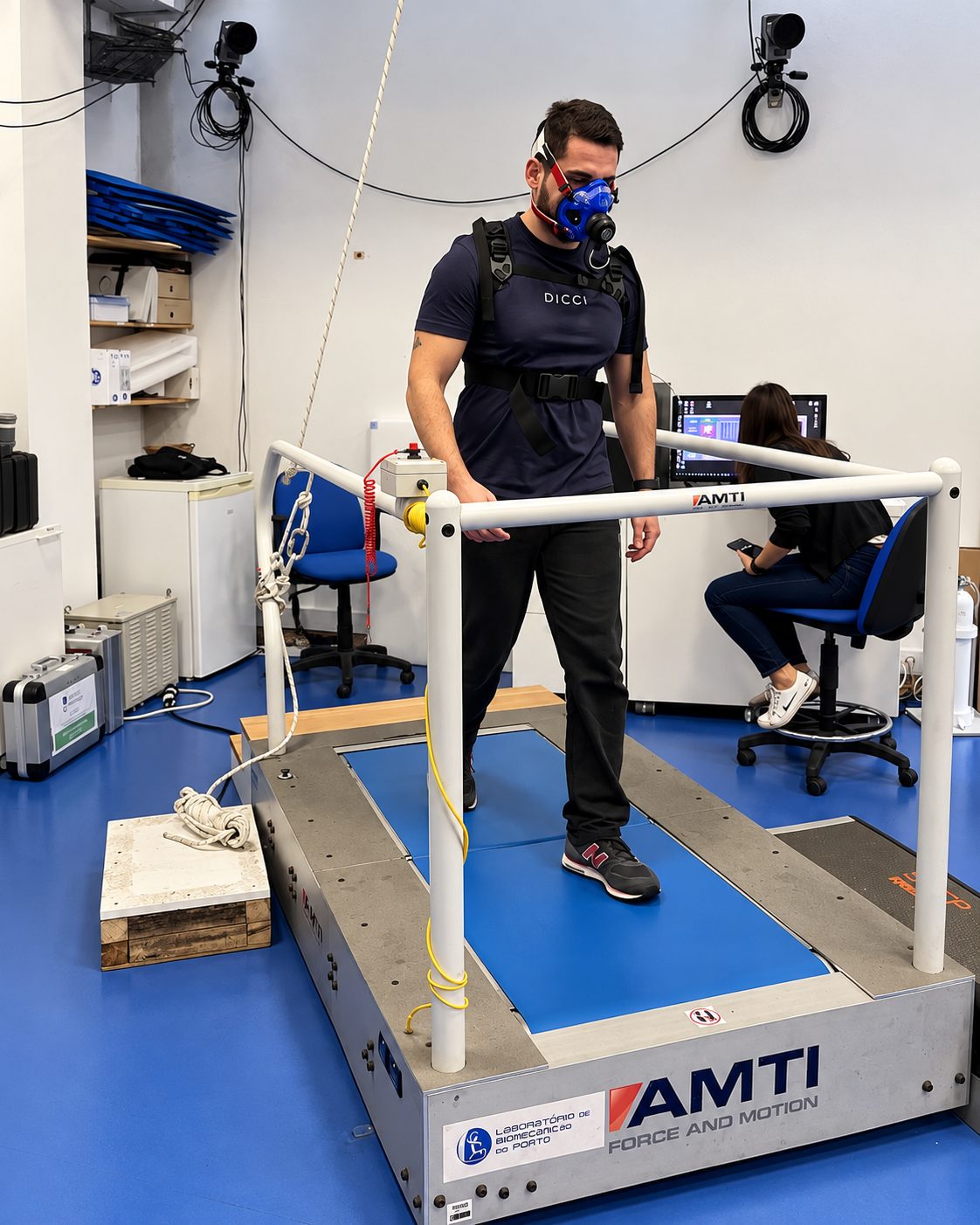 A participant walking on an instrumented treadmill during a KinetikOS laboratory validity study.